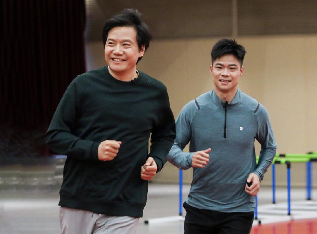 问题 1:雷军和苏炳添为什么会在巴黎重逢?
